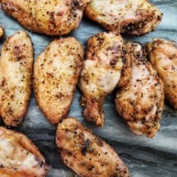 Smoked Wingstop Lemon Pepper Wings with marble background